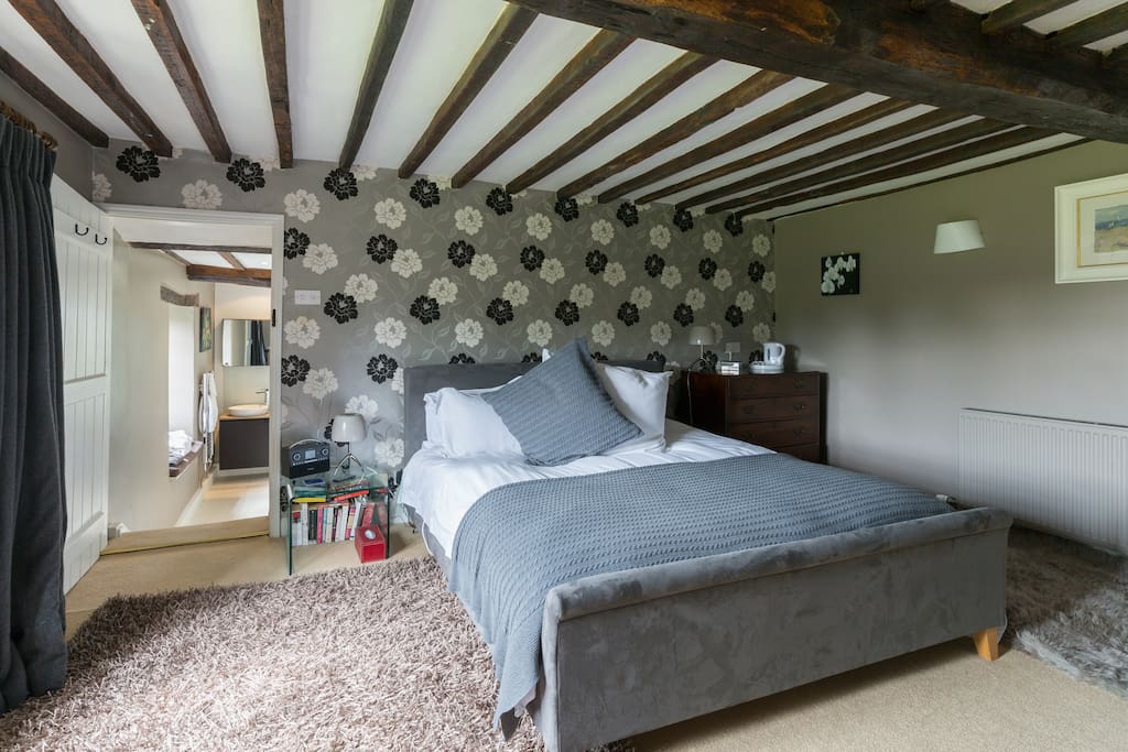 The master bedroom with superkingsize bed and ensuite bathroom...