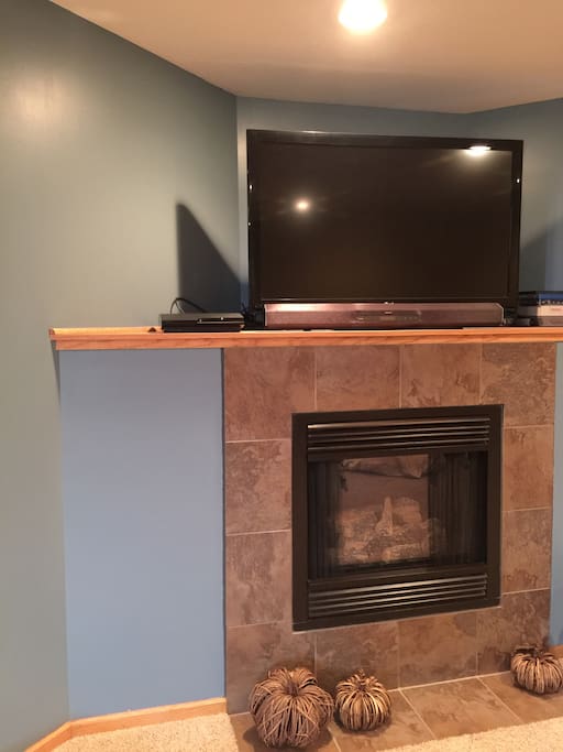 Gas fireplace and tv with streaming capability in den