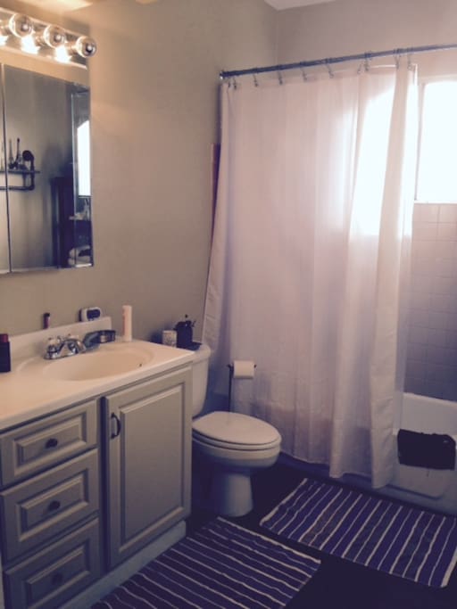 Upstairs bathroom with bathtub, 2 sinks and your own space