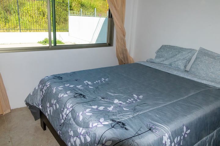 Second bedroom with queen sized bed.
