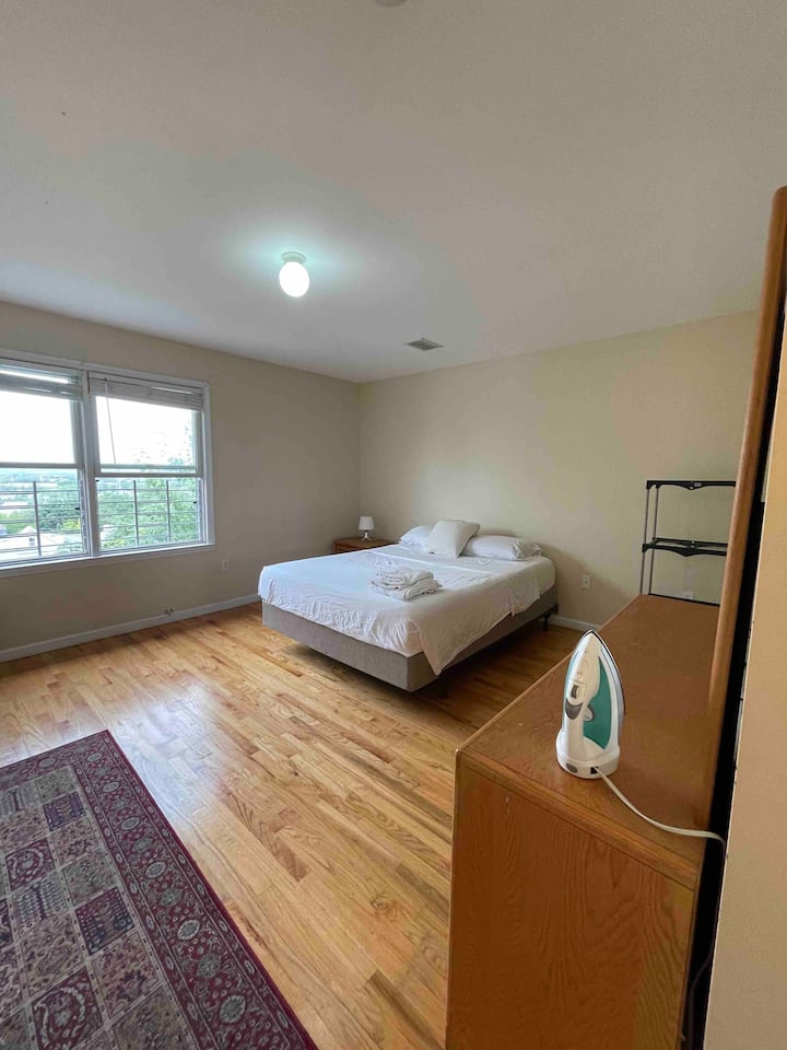 Other view of master bedroom showing huge windows with bug screen etc.