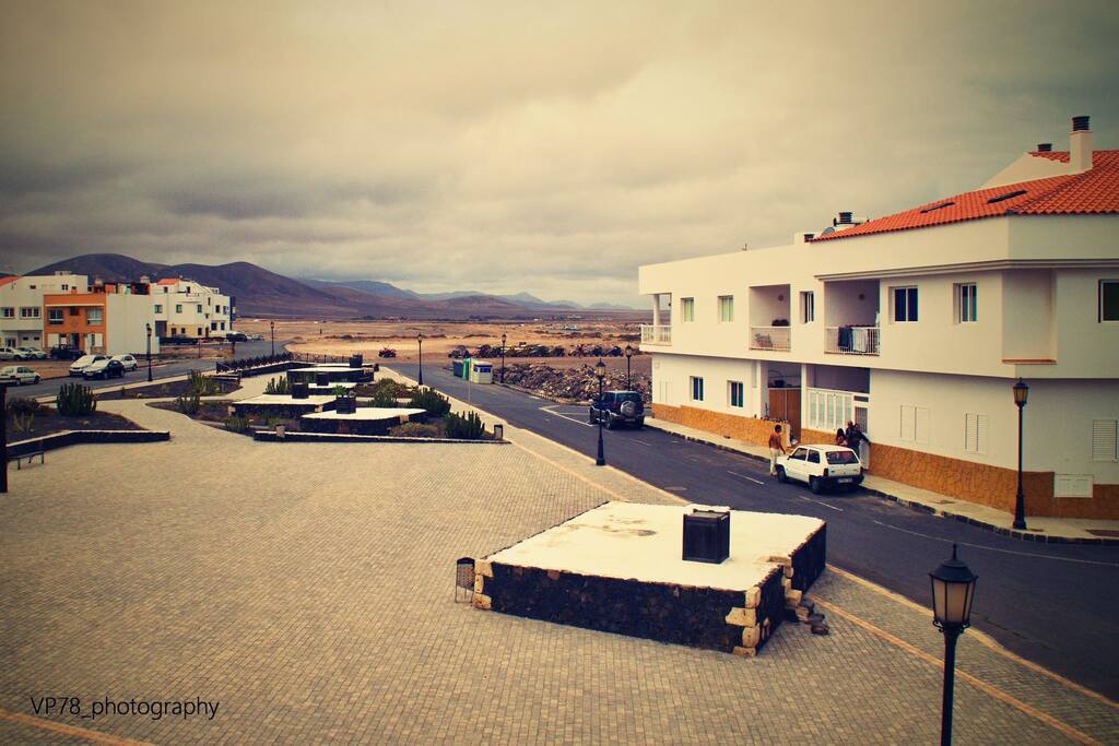 local plaza opposite the flat
