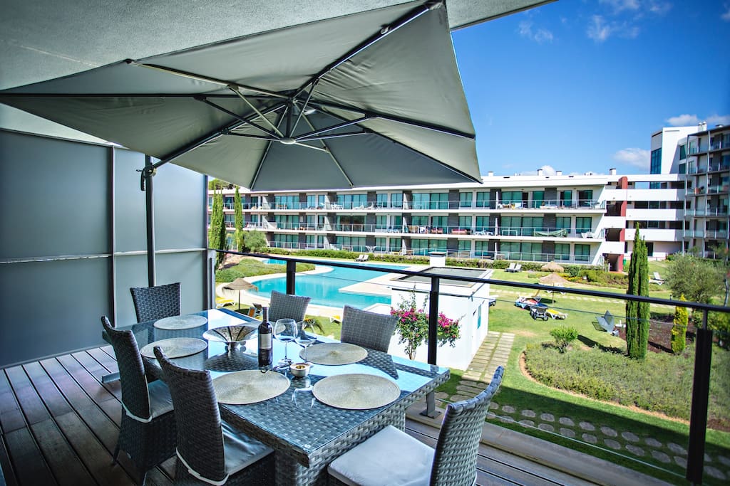 Our new big luxury table with lovely umbrella to protect from the afternoon sunshine