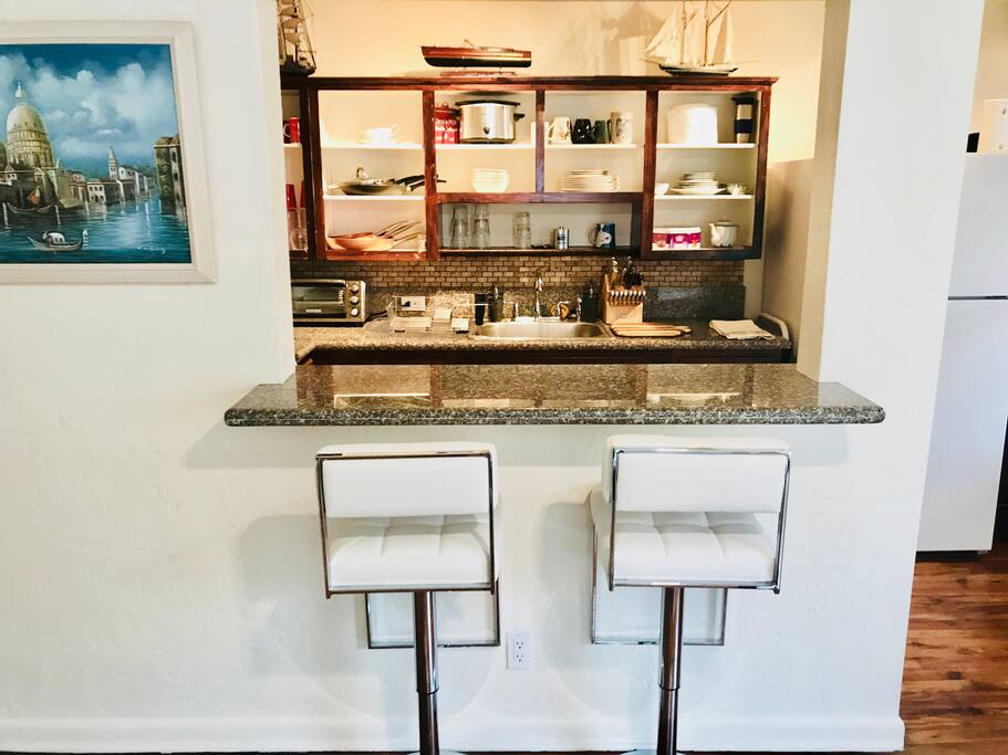 Dining area with granite countertops brand new.