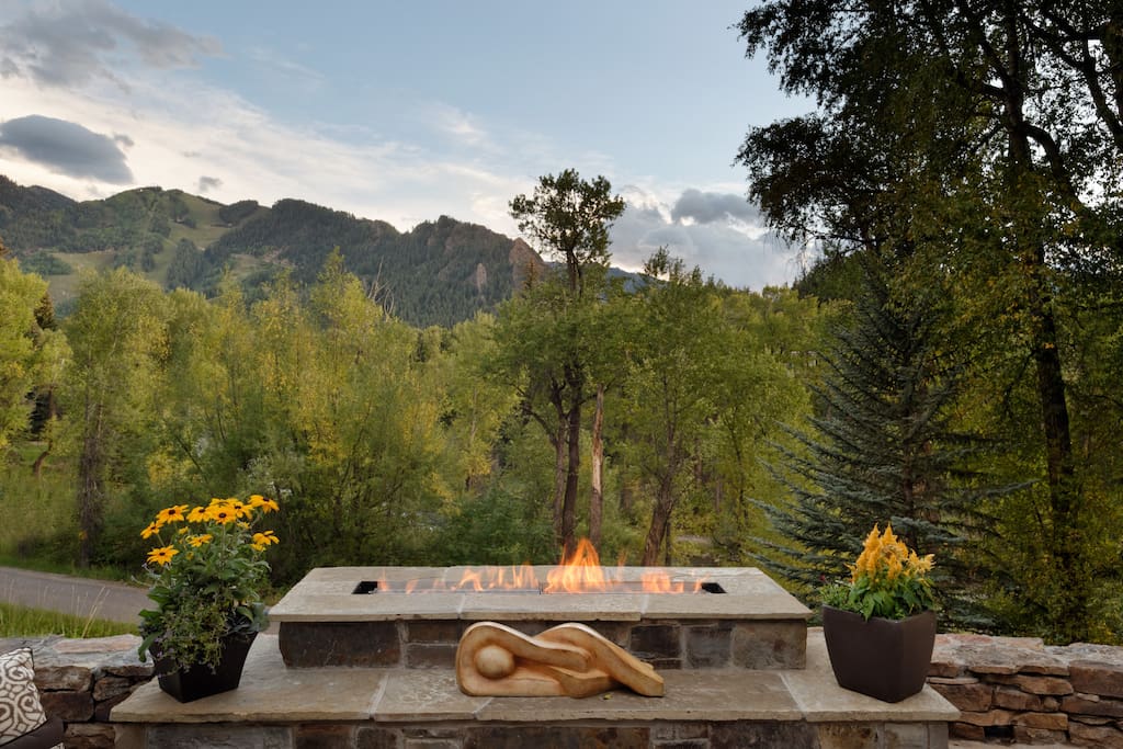 Custom-designed fire feature overlooking Aspen mountain and the Roaring Fork River.