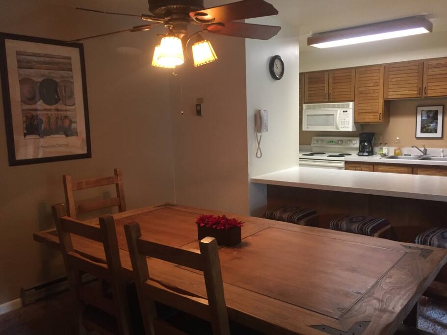 Great dining room table and breakfast bar.