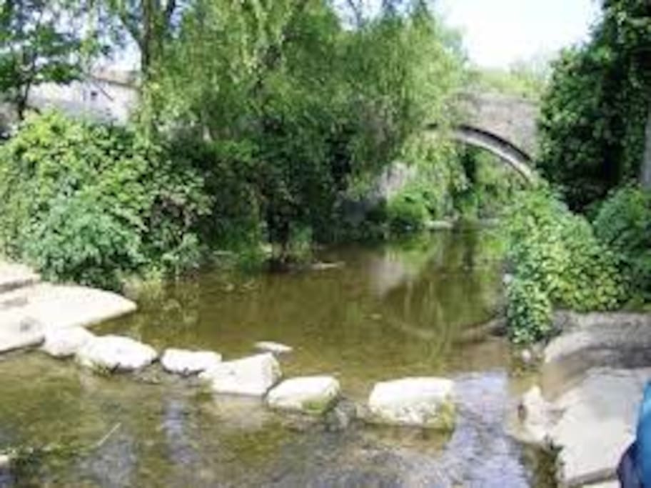 river, packhorse bridge and stepping stones