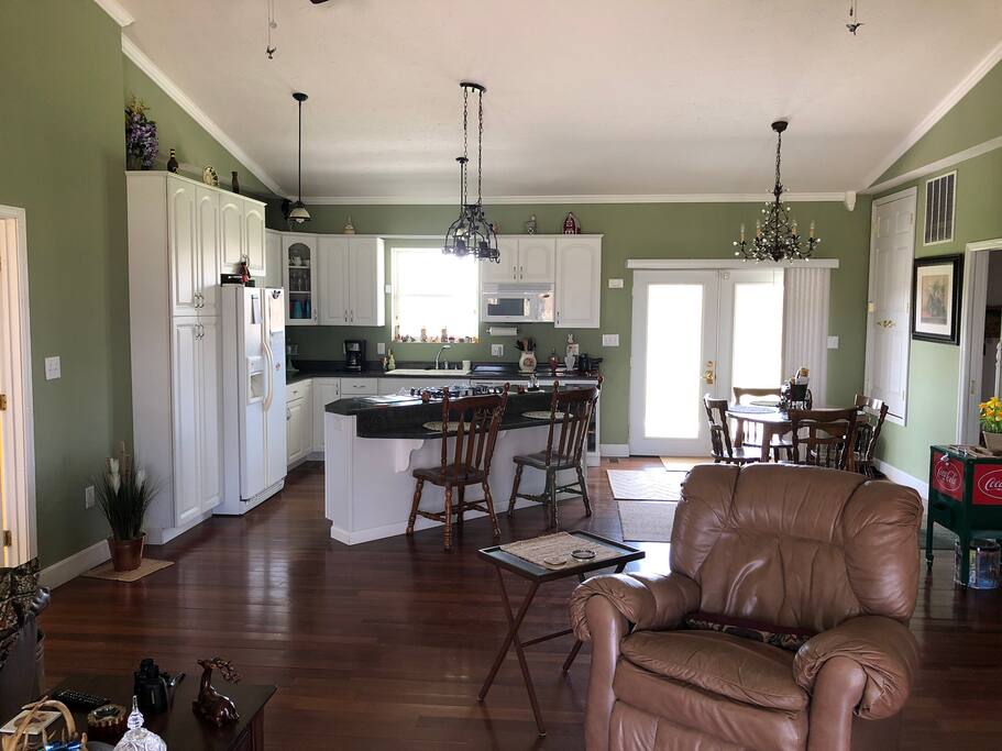 Kitchen, City water, Gas Stove, Microwave and Refrigerator. Lots of utensils and cookware.