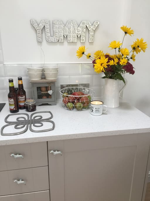 Flowers from the cottage garden, apples from our orchard, eggs from our hens when they are laying, beer from our brewery Glastonbury Ales