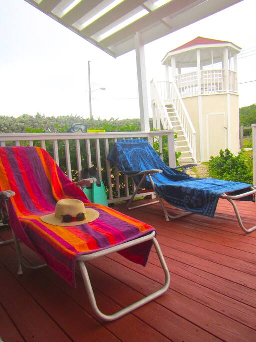 The front porch is a great space to stretch out and enjoy the fresh sea breezes