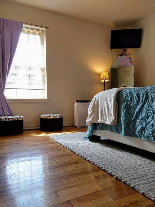 Bedroom: I usually add a portable closet where the air purifier is to make it easier for guests to hang there clothes in a private space.