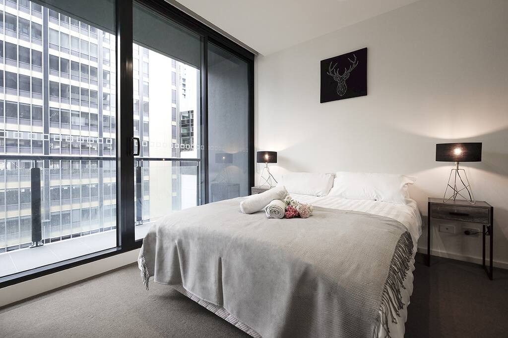 Bedroom with lots of natural light during the day.
