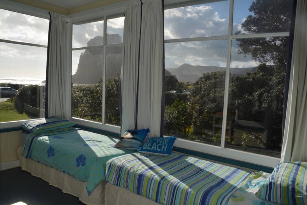 Sunroom with views of Lion rock & ranch slider to deck