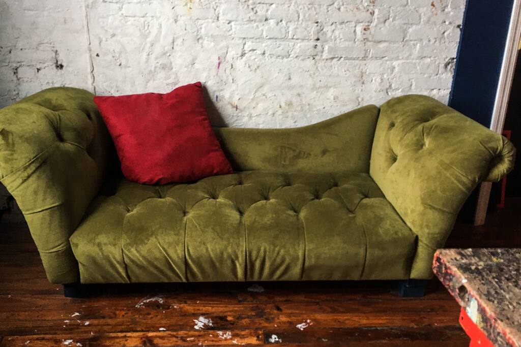 Couch in the bedroom.