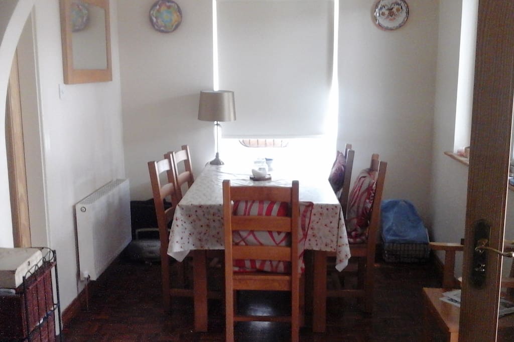 Shared dining table in Kitchen area.