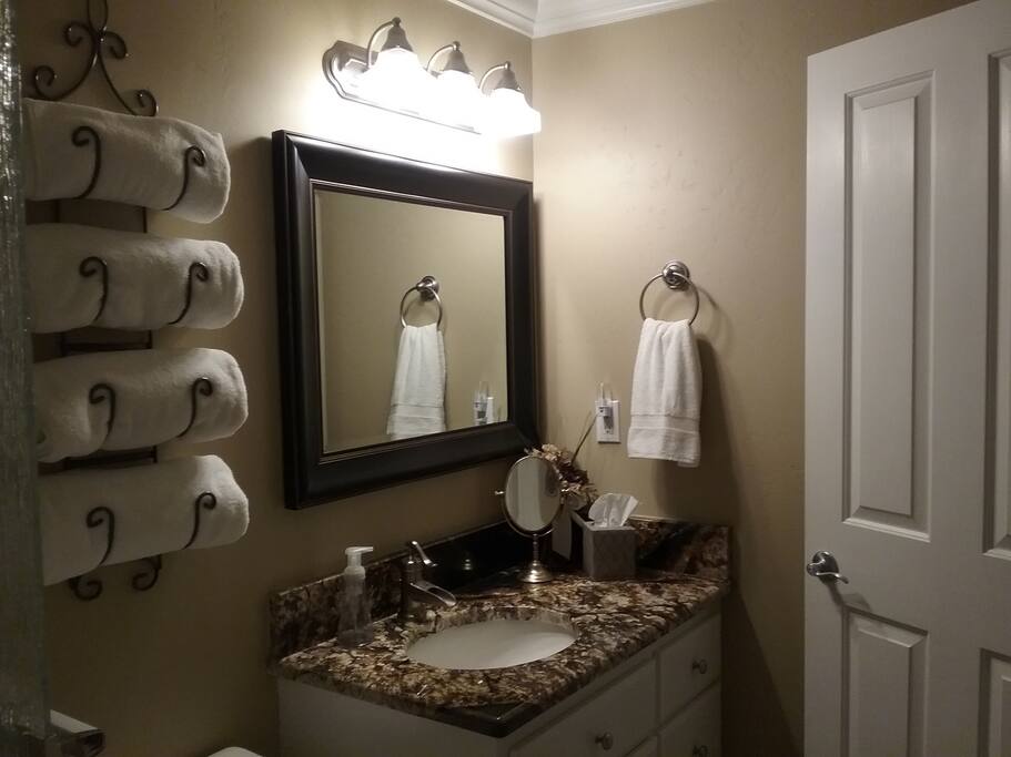 Bath, with enclosed shower tub.