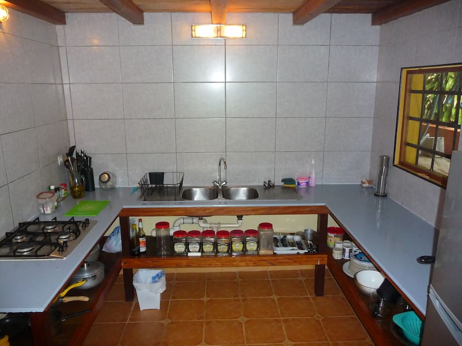 The kitchen is small, but fully equipped with fridge freezer, stove, pots, pans and much more.