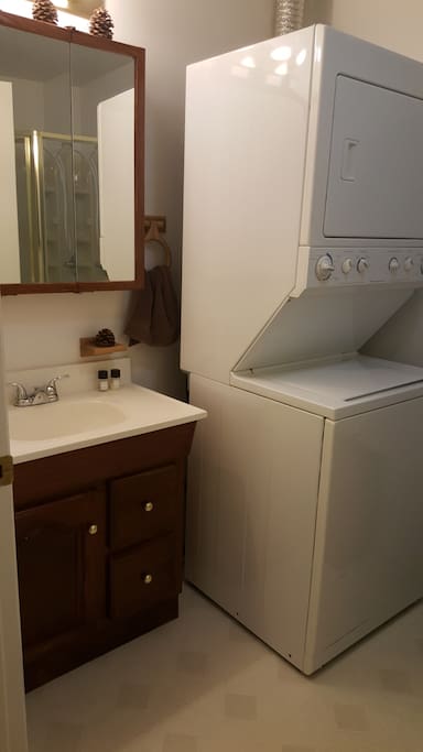 1.75 bathroom with shower and washer and dryer.