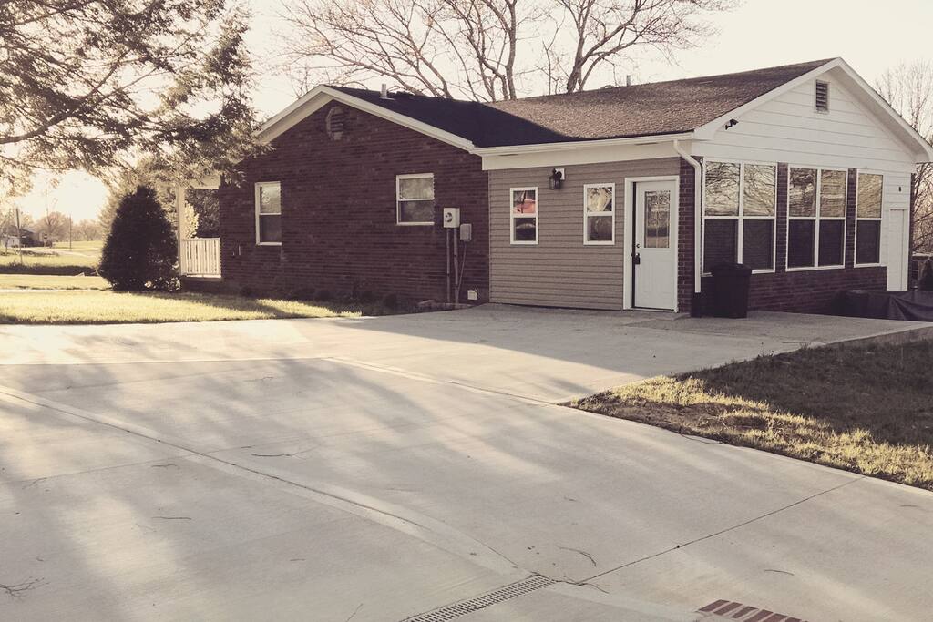 Rear entry into kitchen off Concrete Driveway