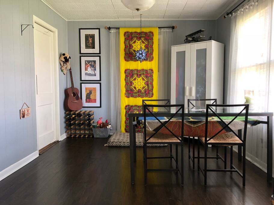 Dining Room. Makes a nice bright place to work on a laptop and have a snack. Kitchen through the door.