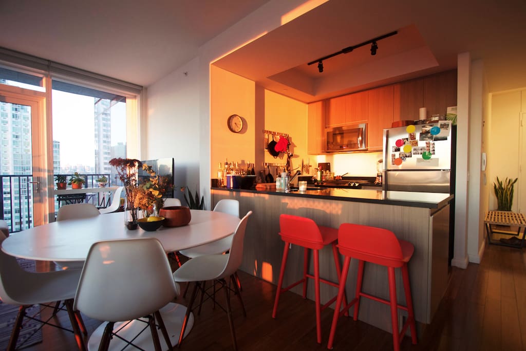 Fully equipped kitchen with dishwasher and bar stools—a great spot for breakfast.