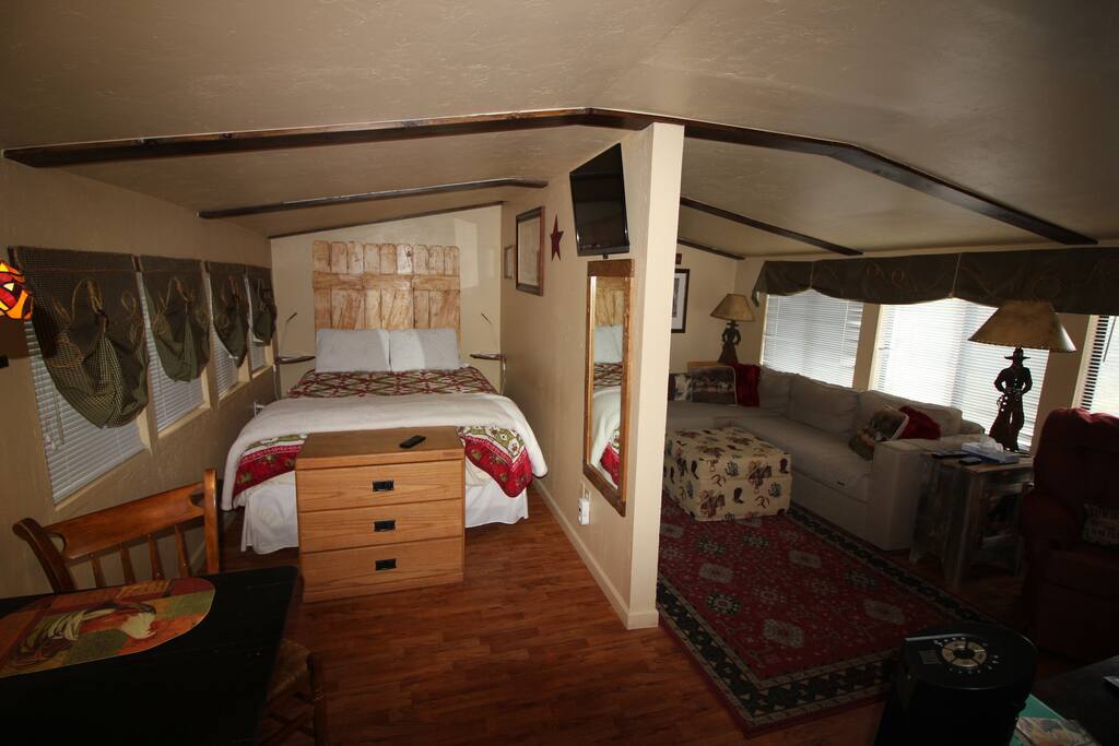 Another view of bedroom and living area