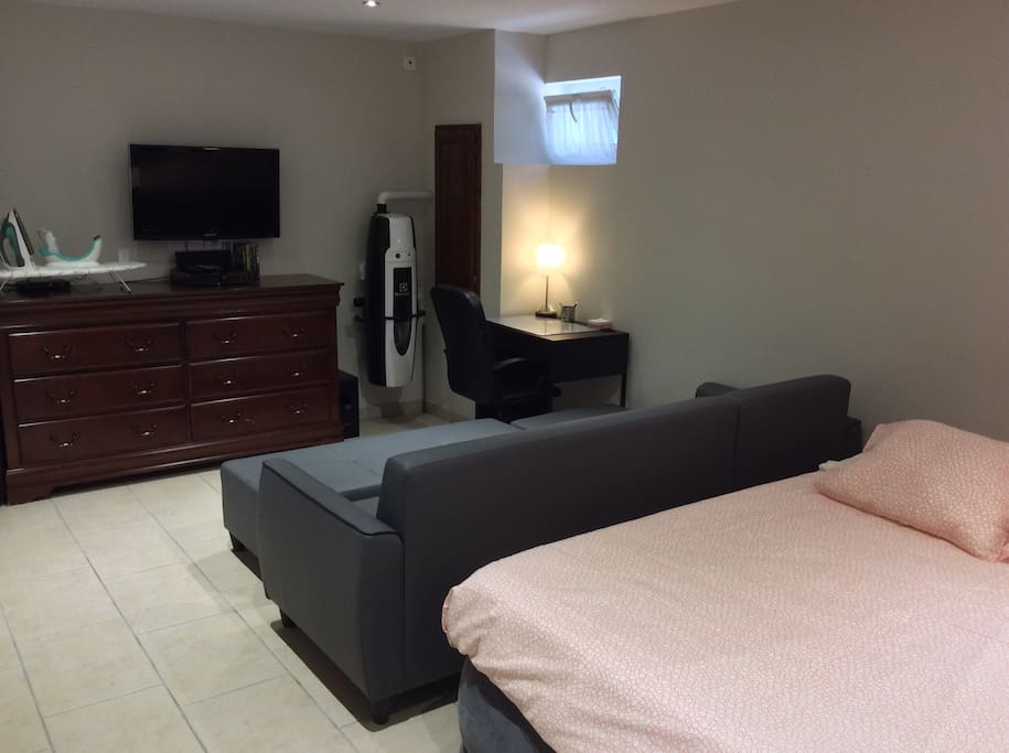 cable free iron and iron board available, TV, DVD, Desk, Couch and new fulll size bed for max comfort