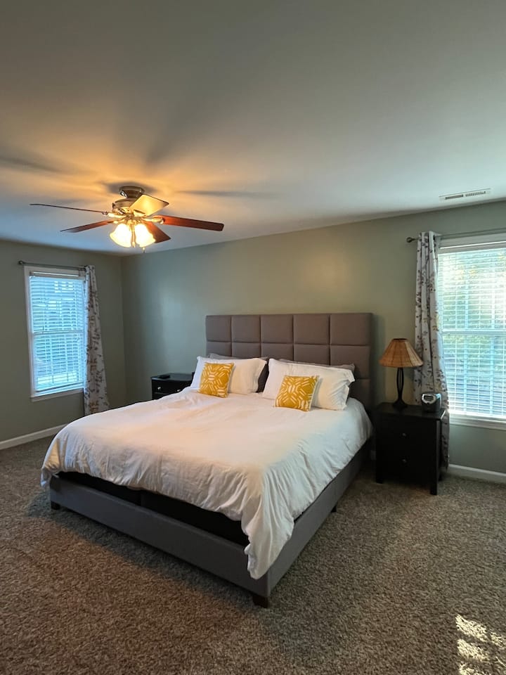 Master bedroom. King Temperpedic bed.  Tv. Attached full bathroom. 