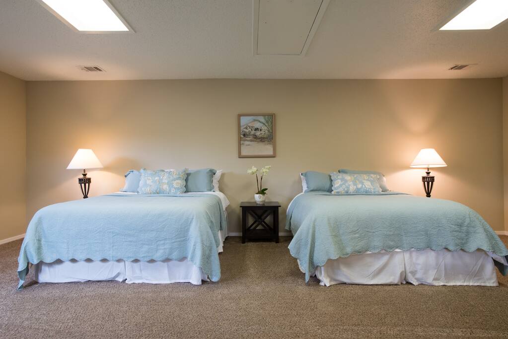 Huge bedroom with 2 queen size beds.