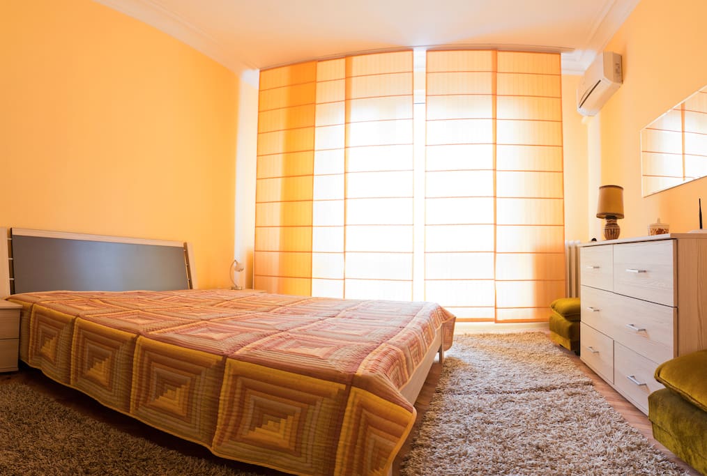 Large master bedroom with queen-sized bed