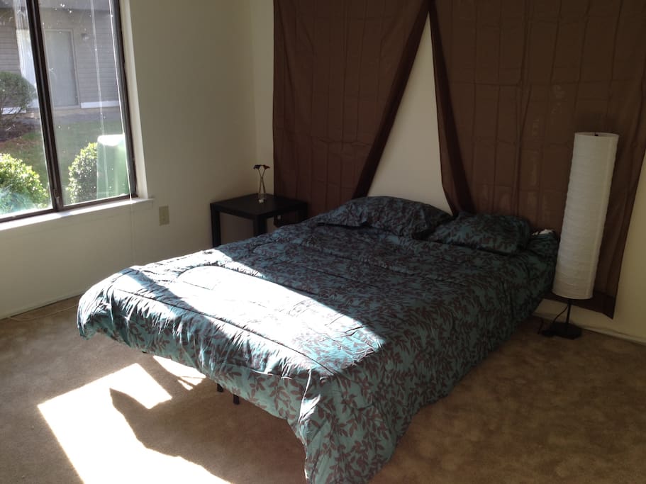bedroom with platform queen bed