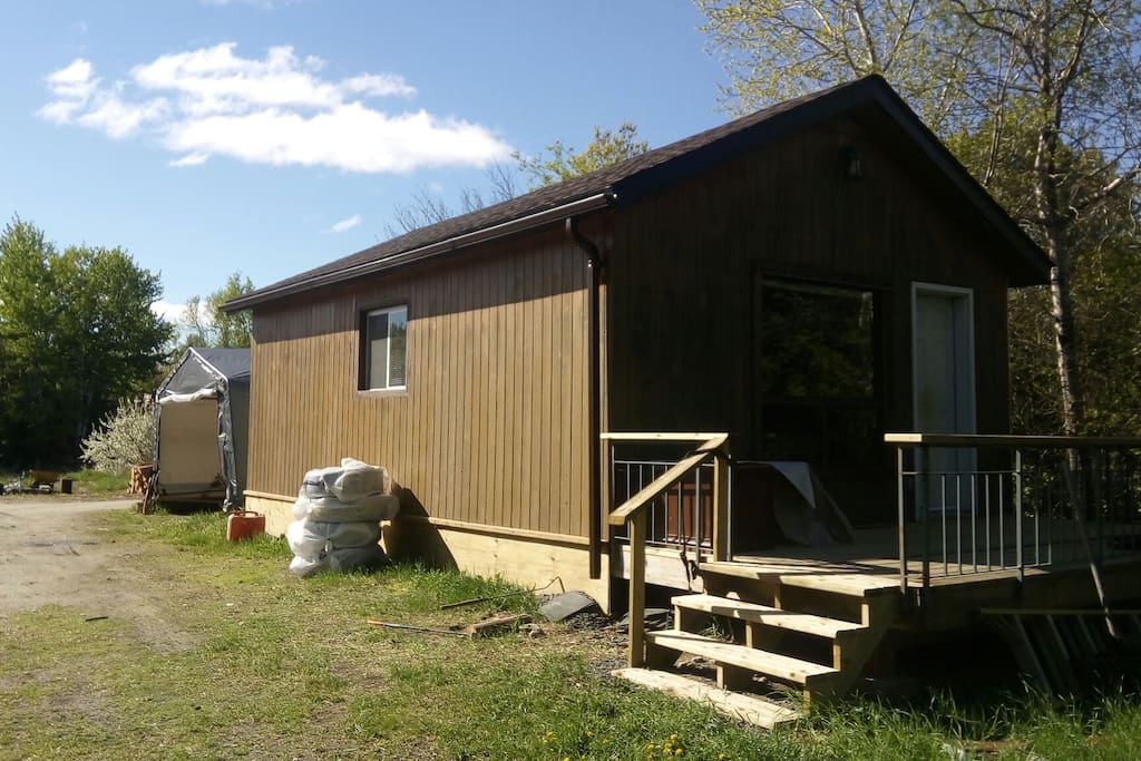 rental cabin, shared driveway.