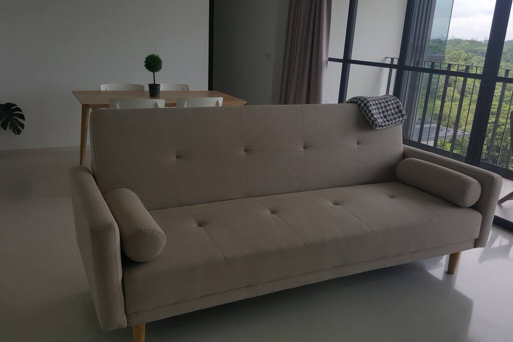 The living room where you are welcome to lounge around and use your laptop.