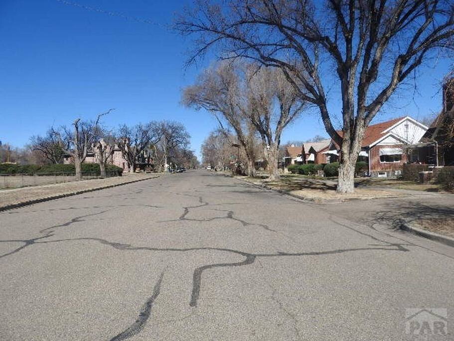 wide street with a lot of parking
