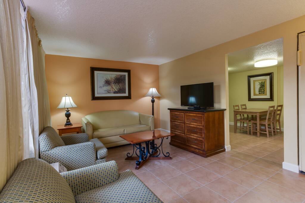 Living room with view of kitchen table