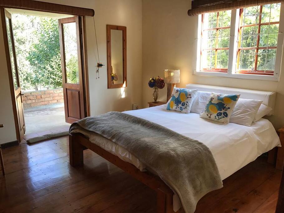Hillside Country Lodge features beautiful yellow-wood floors and ceilings, three modern bathrooms, four double bedrooms each opening onto the verandah