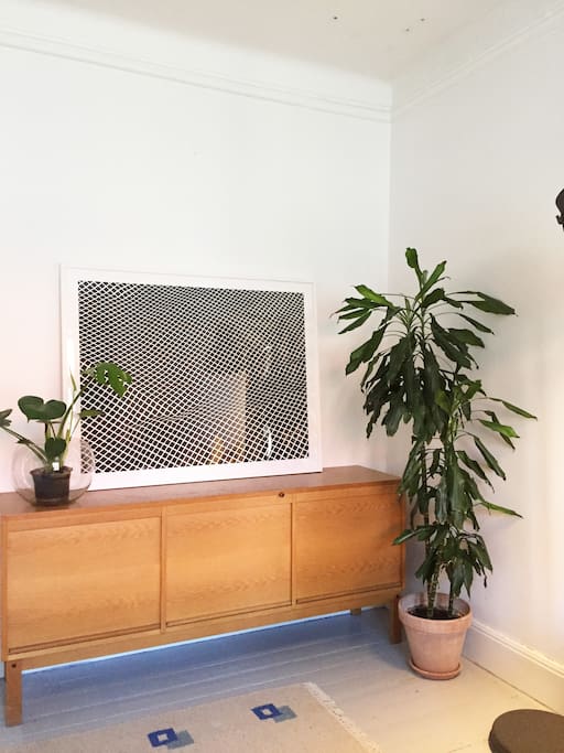 The bedroom with art work and plants :)