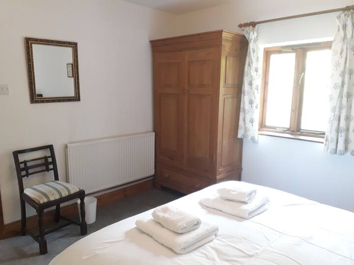 Stanza king-size al piano di sotto 