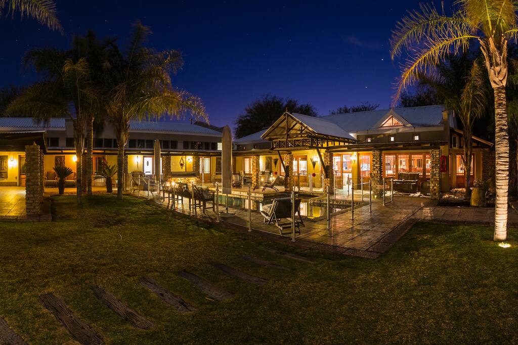 Swimming Pool with dining area, bar and lounge area