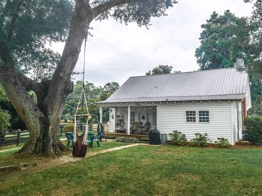 View of the back of the house, displaying our brand new swing.