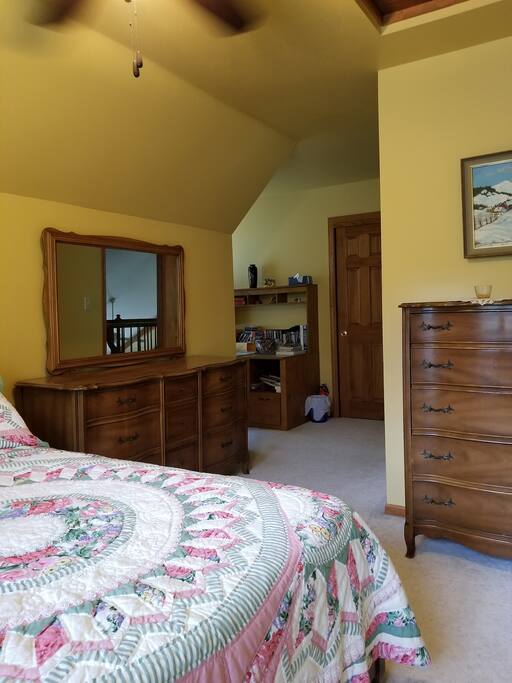 North bedroom looking south closet, desk, mirror & chest
