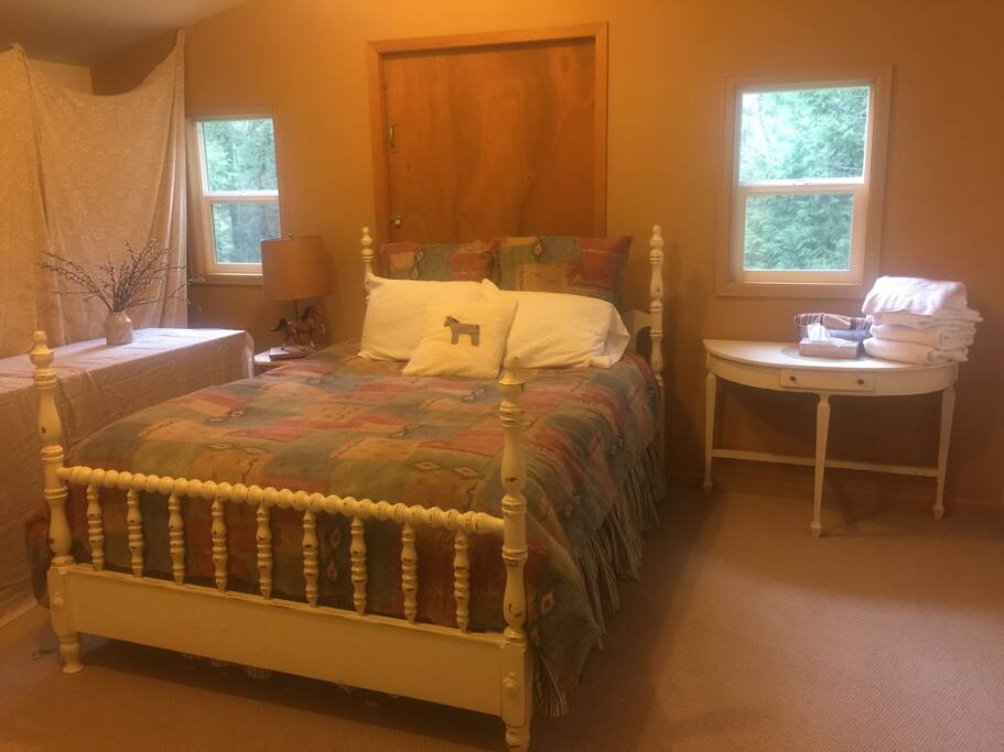 Queen size bed in back room