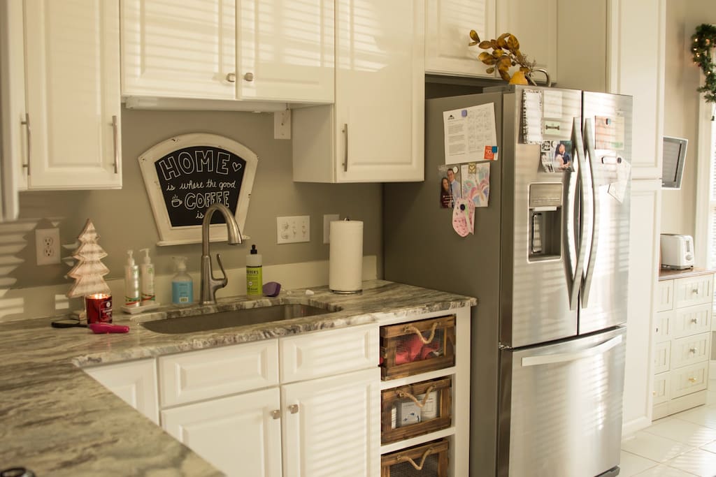 Kitchen newly renovated with brand new granite countertops and stainless steel appliances!