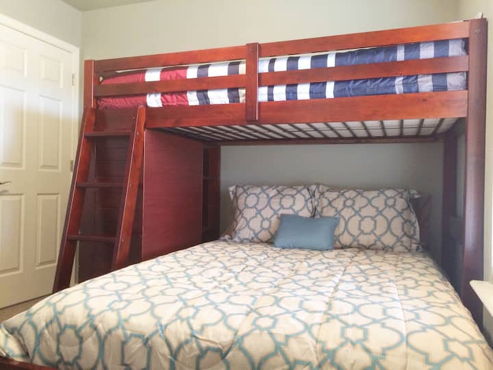 The Double Suite has a ceiling fan and a twin bed with memory foam mattress over a double bed with soft mattress.