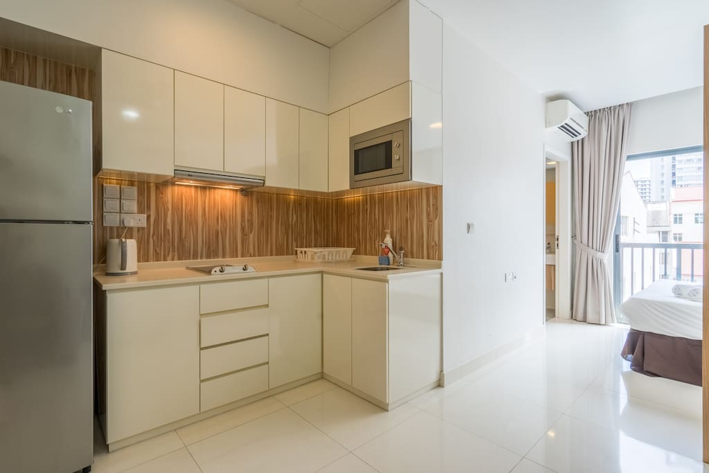 Kitchen View + Bedroom