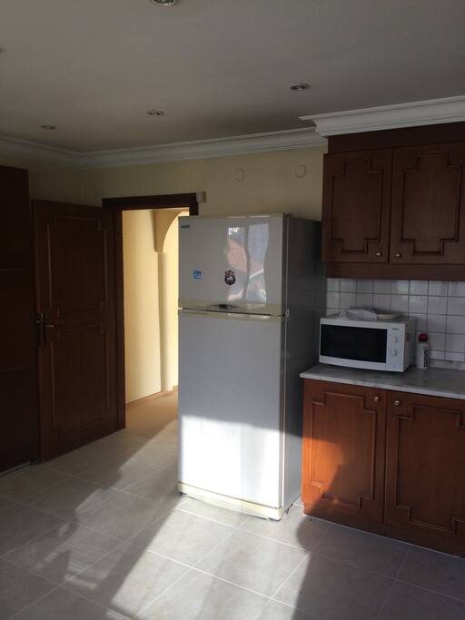 The kitchen is full and ready to use.