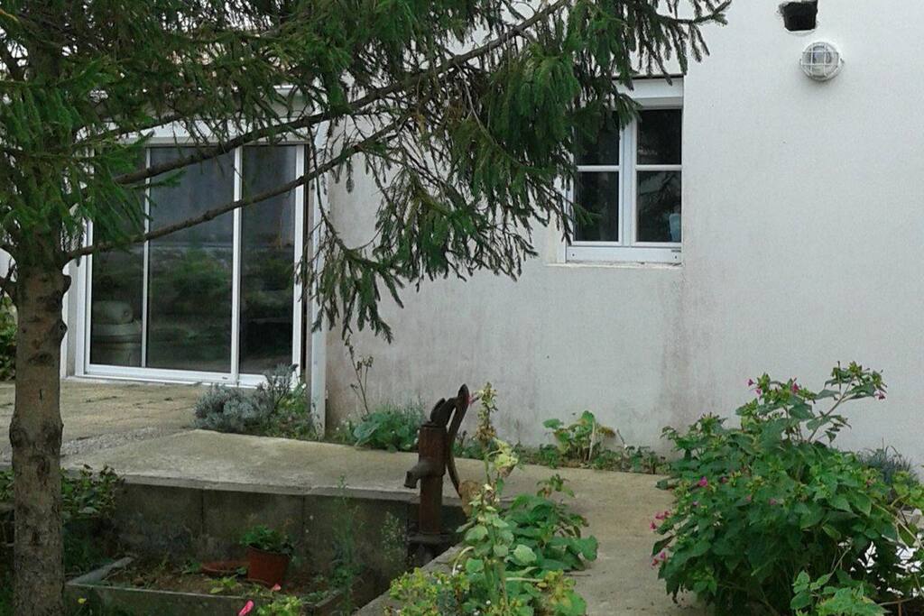 Accès jardin et véranda