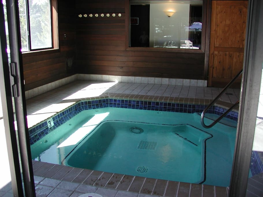 Hot tub is directly across from the condo