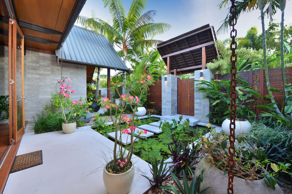 Front entrance filled with water lilies