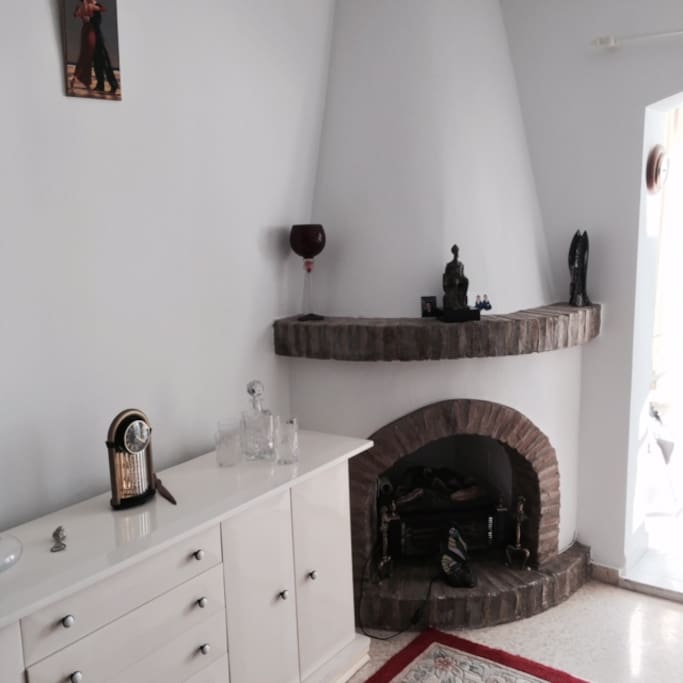 Fireplace with electric fire